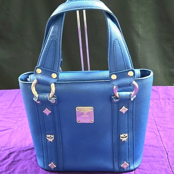 MCM Handbags - EUC MCM ROYAL BLUE LEATHER FLAP TOTE BUCKET BAG
